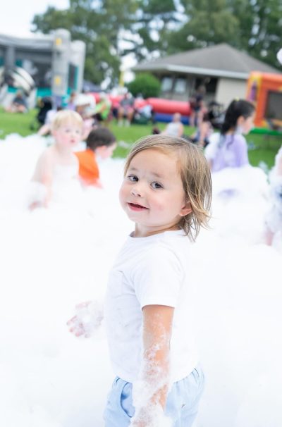 toddler in bubbles